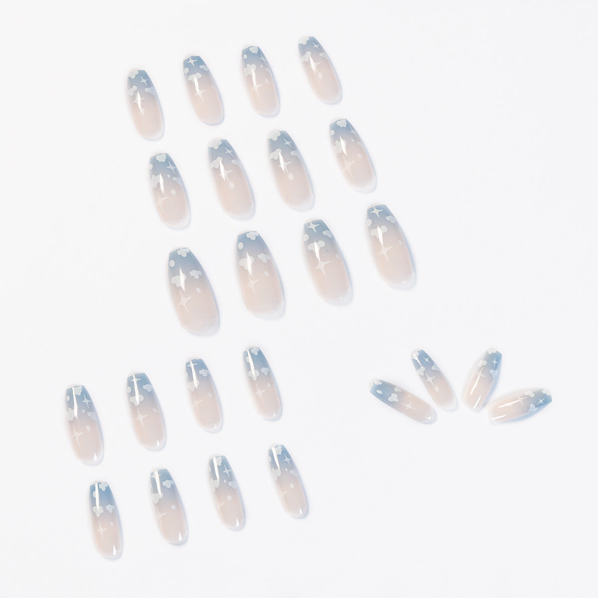 Pink false nails press-on reusable design close-up showing natural finish