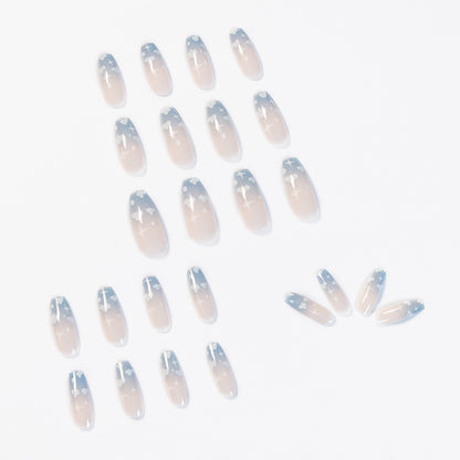 Pink false nails press-on reusable design close-up showing natural finish