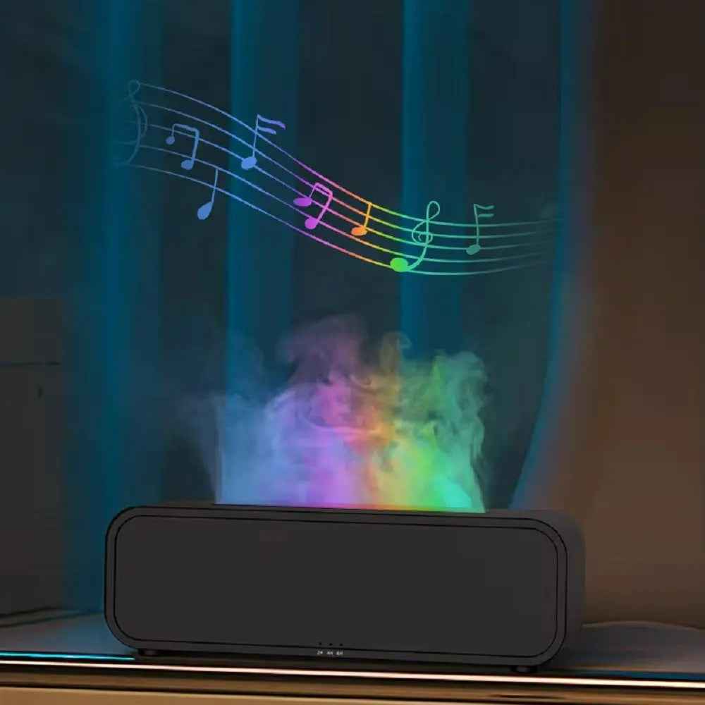Black flame aroma diffuser showing mist output and color changing lights in office