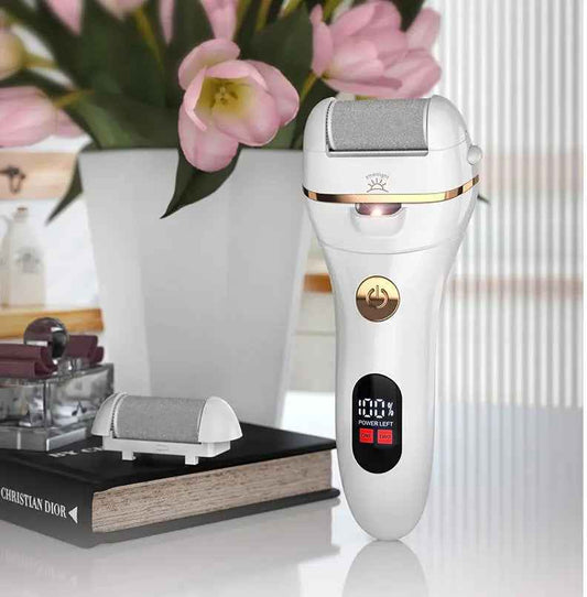 Electric foot callus remover in green showing rotating grinding head